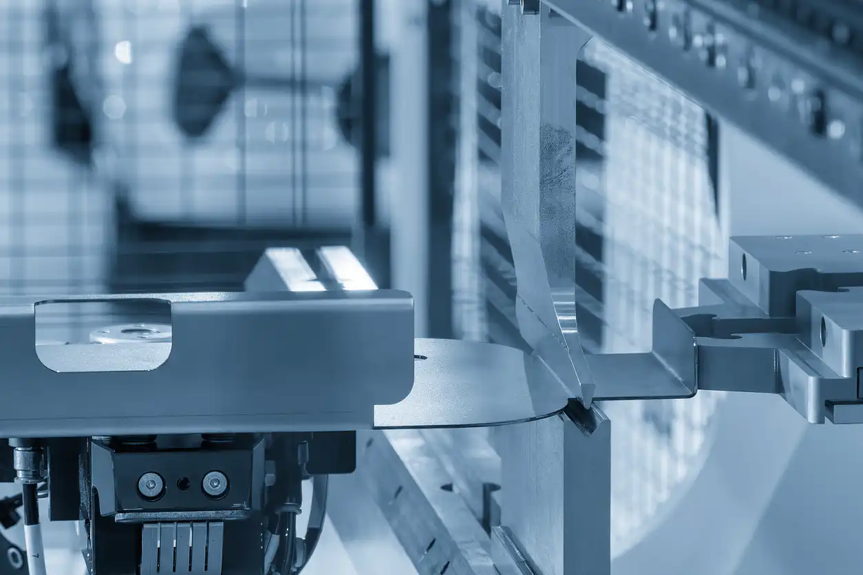 A closeup of automated panel bending equipment