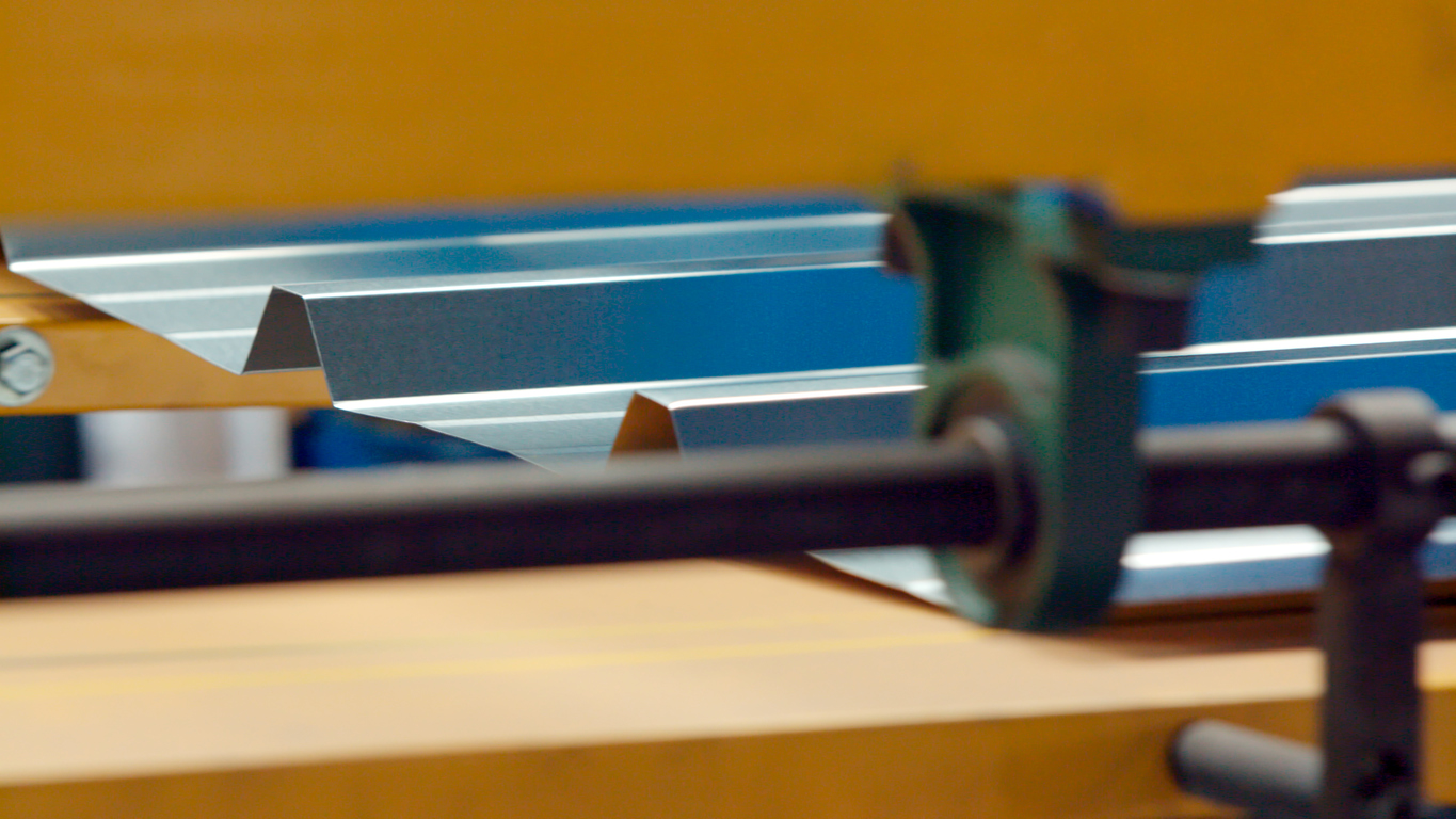 A closeup of automated panel bending services